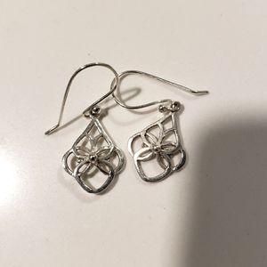 Women's Celtic Knot Flower Dangle drop earrings in Sterling silver.
